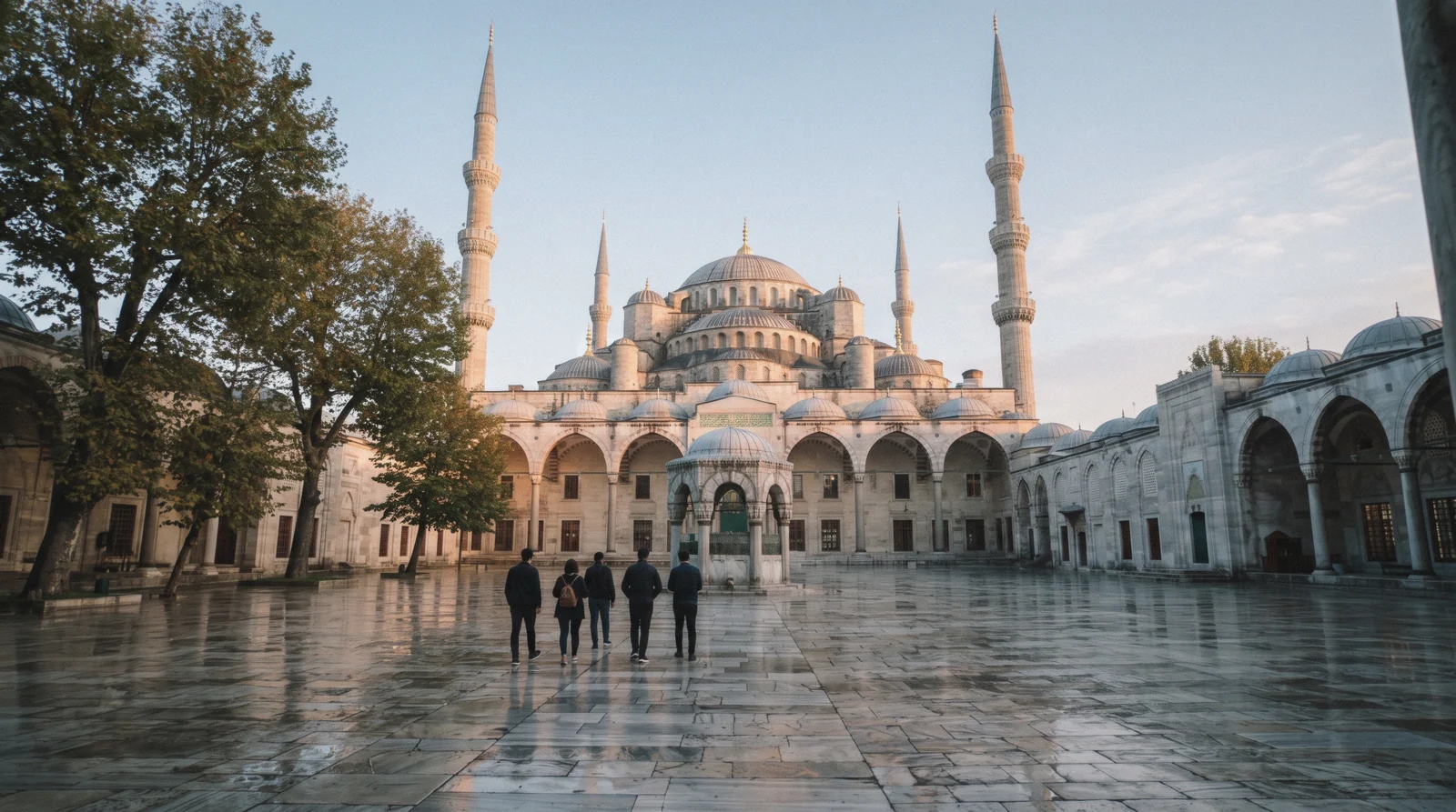 The six minarets and cascading domes of the Blue Mosque seen from the courtyard in Istanbul, Türkiye